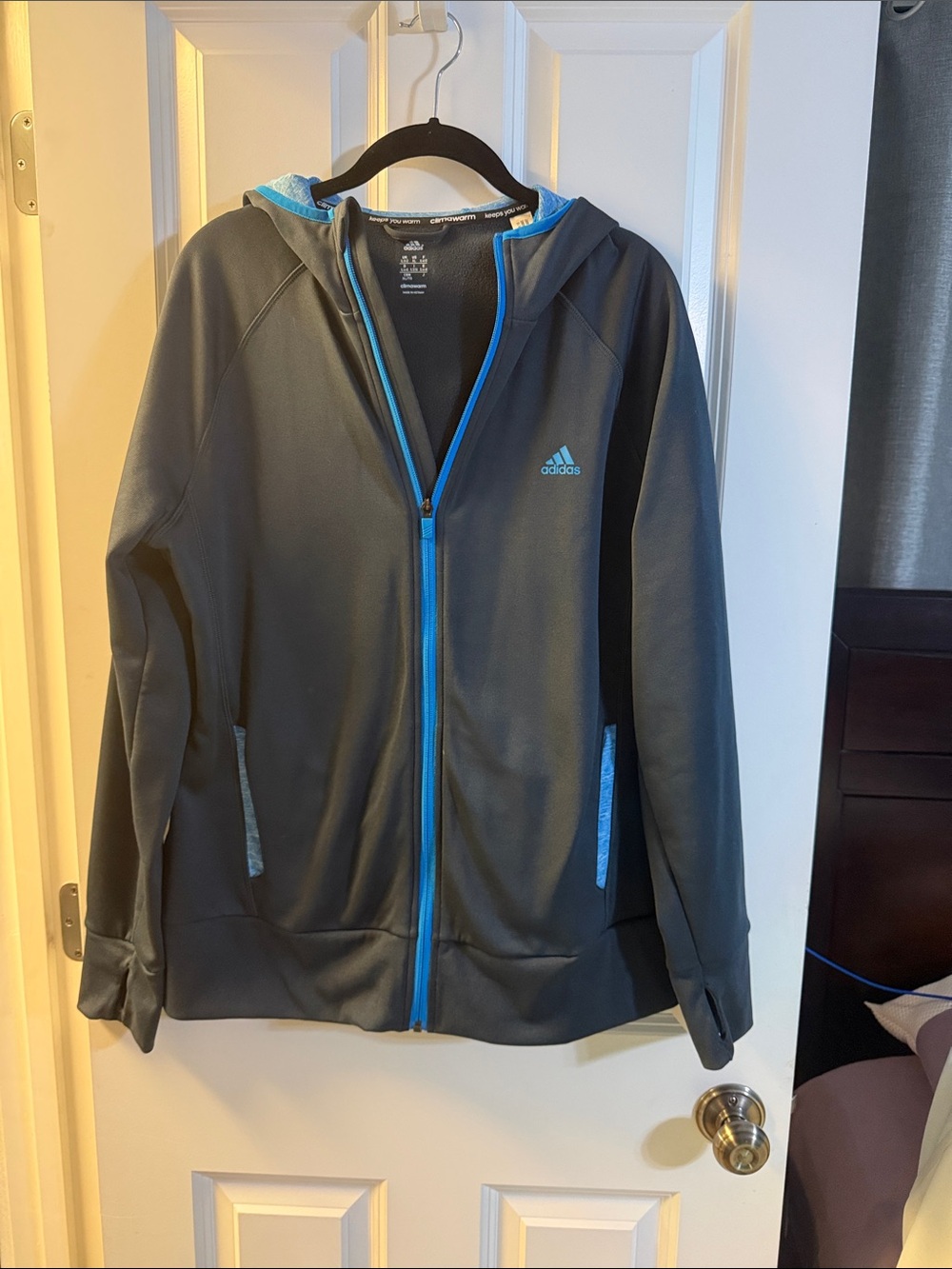 adidas Men’s Black Hooded Performance Jacket with Blue Accents